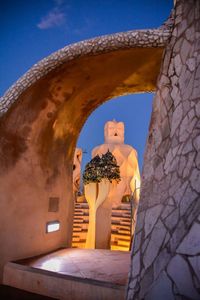 Low angle view of building against blue sky