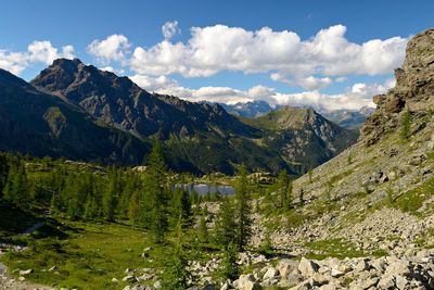 Scenic view of landscape and mountains against sky