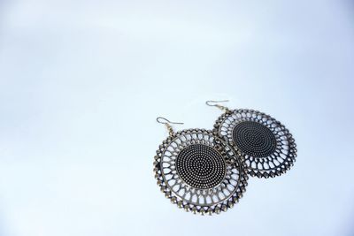Close-up of ferris wheel against white background