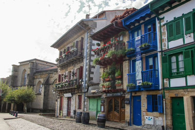 Low angle view of buildings against sky