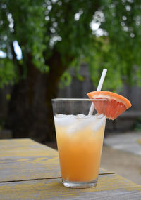 Close-up of drink on table outdoors