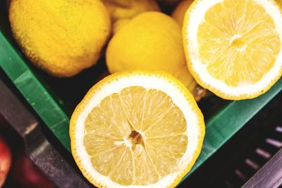 Close-up of lemons in crate at market