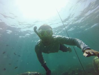 Man swimming in sea