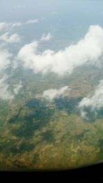 Aerial view of agricultural landscape against sky