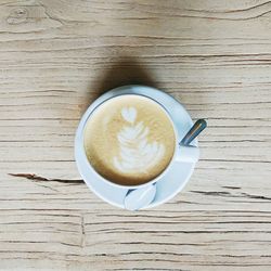 High angle view of cappuccino on table