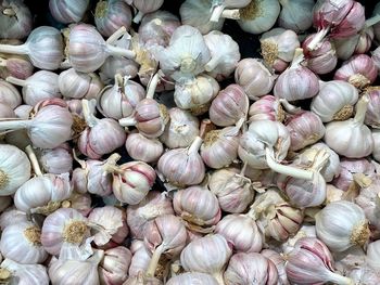 Full frame shot of onions for sale at market