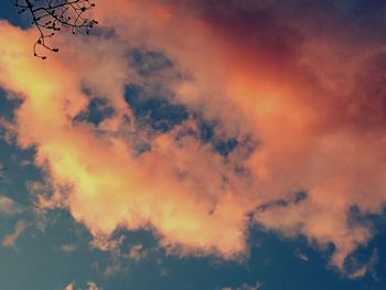 Low angle view of dramatic sky during sunset