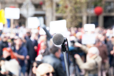 Microphone against crowd during event