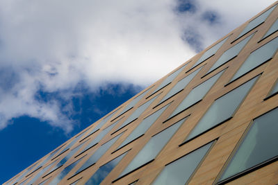 Low angle view of modern building against sky