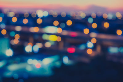 Defocused image of illuminated lights at night