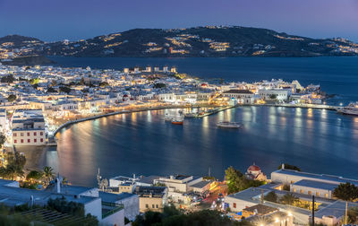 High angle view of illuminated town against sky