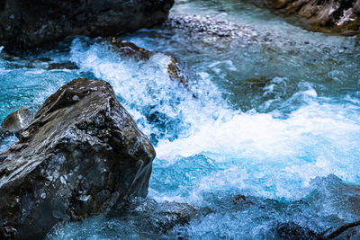 Sea waves splashing on rocks