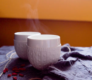 Close-up of coffee cup on table