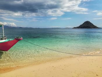 Scenic view of beach against sky