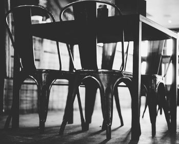 Low angle view of tables and chair arranged at restaurant