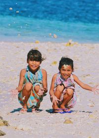 Happy friends enjoying at beach