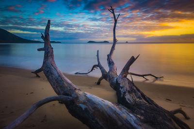 Scenic view of sea against sky at sunset