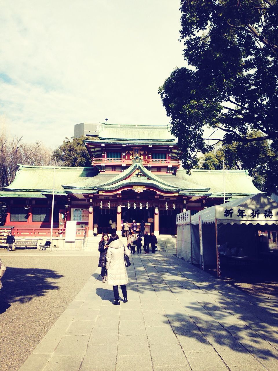 architecture, built structure, building exterior, large group of people, religion, place of worship, person, spirituality, temple - building, famous place, travel destinations, tourism, travel, men, cultures, tradition, sky, tree