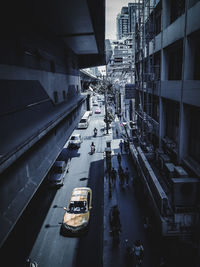 High angle view of street amidst buildings in city