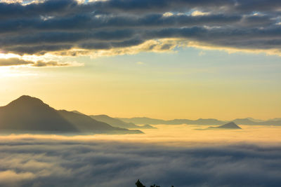 Scenic view of mountains against sky during sunset