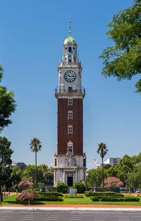 Low angle view of clock tower against sky