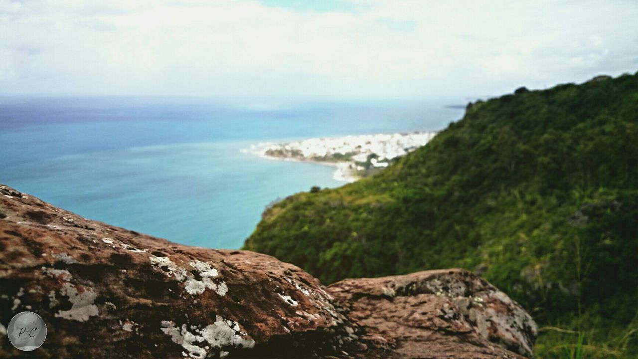 sea, water, horizon over water, scenics, beauty in nature, tranquil scene, tranquility, sky, rock - object, nature, rock formation, rock, idyllic, shore, beach, day, cliff, high angle view, coastline, outdoors