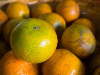 Close-up of orange fruits in market