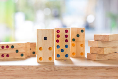 Close-up of wooden dices on table