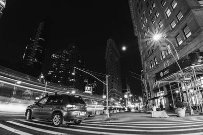 Light trails on city street at night