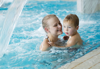 Little girl in swimming pool