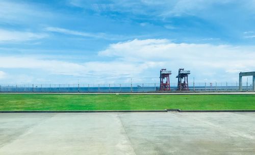 Scenic view of airport against sky