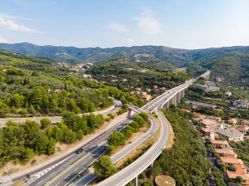 High angle view of highway in city against sky