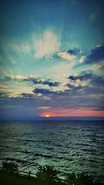 Scenic view of sea at sunset