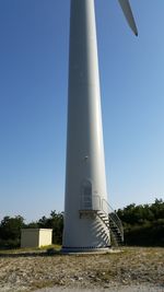 Low angle view of built structure against clear blue sky