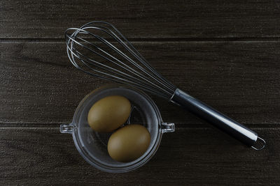 High angle view of eggs in container on table