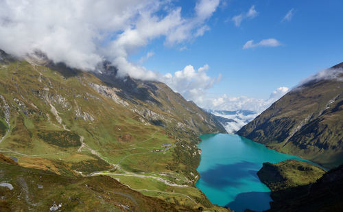 Panoramic view of lake and mountains against sky