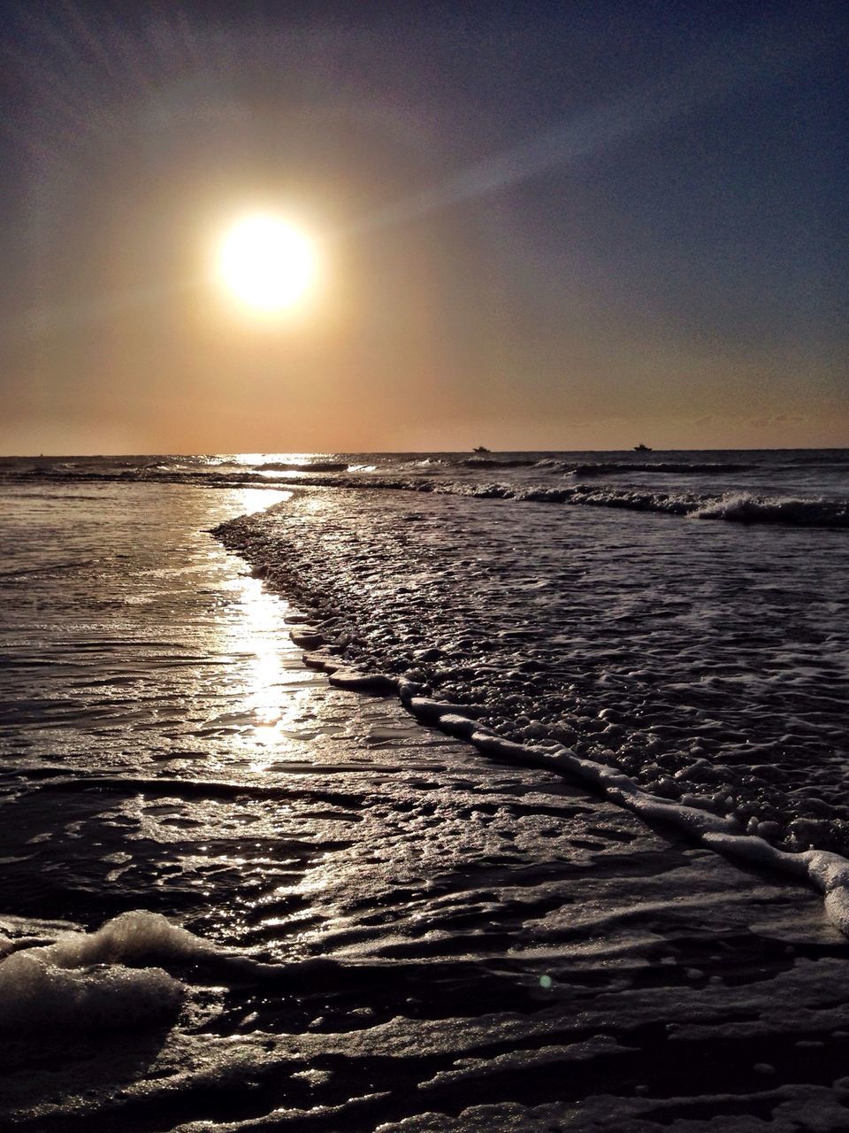 sea, water, horizon over water, scenics, tranquil scene, sun, beauty in nature, tranquility, sunset, beach, sky, wave, nature, shore, rippled, idyllic, sunlight, reflection, seascape, rock - object