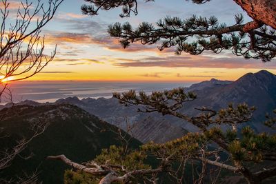 Scenic view of mountains against sky during sunset