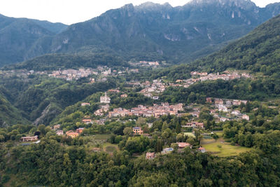 High angle view of townscape against mountains