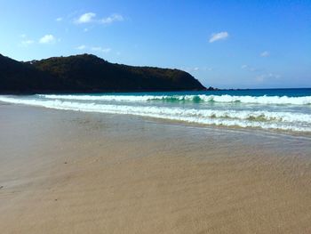 Scenic view of beach against sky