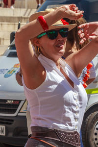 Young woman wearing sunglasses