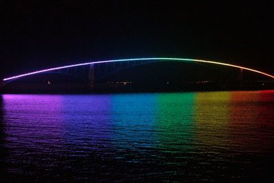 Illuminated fountain at night