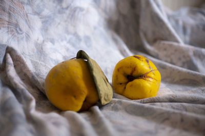 High angle view of yellow fruit on bed