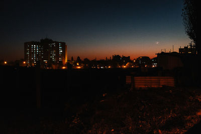 View of illuminated city at night