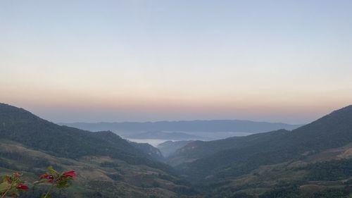 Scenic view of mountains against sky during sunset