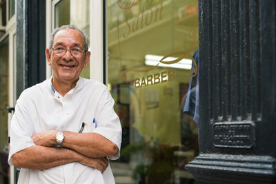 Portrait of mature man standing outdoors