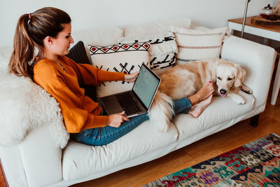 Woman with dog at home