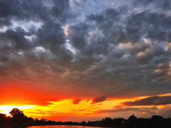 Low angle view of dramatic sky during sunset