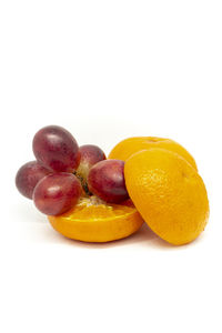 Close-up of oranges against white background