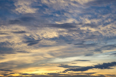 Low angle view of clouds in sky during sunset